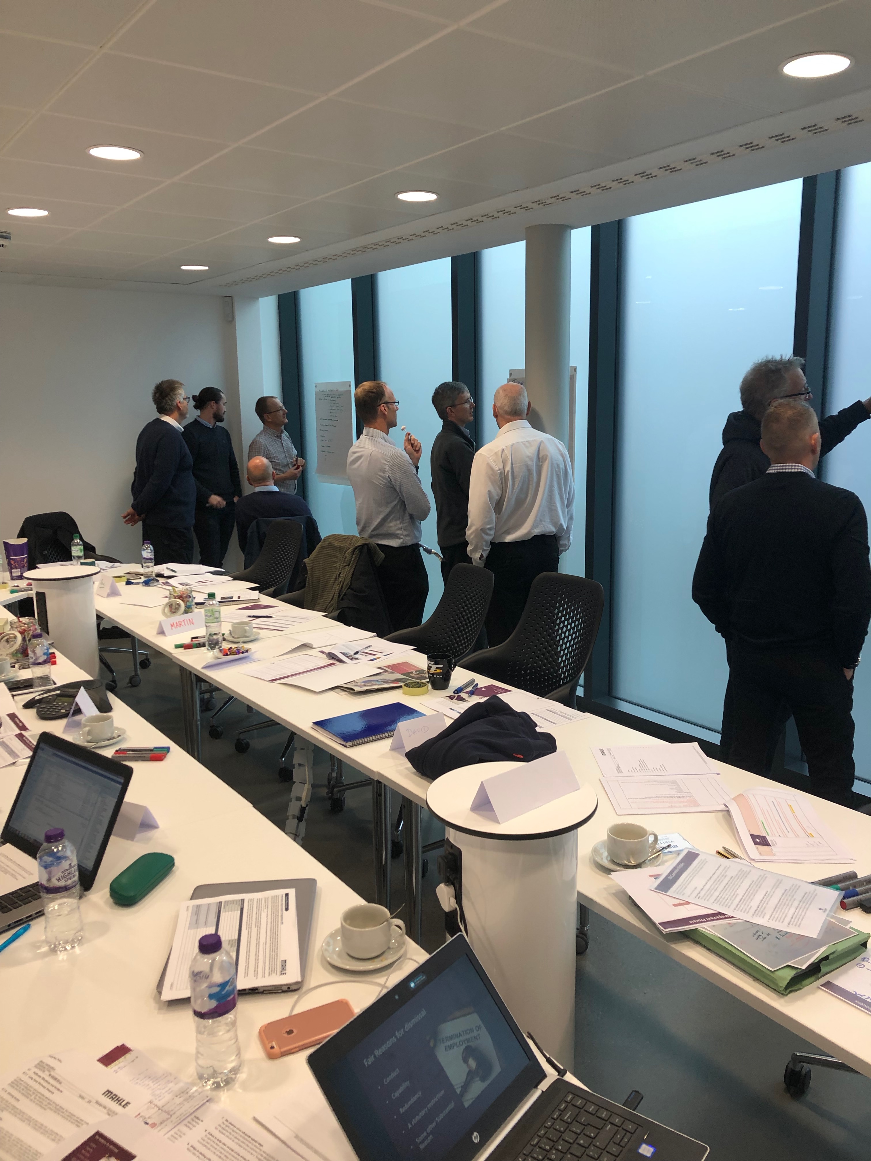 Leadership team working on strategy during an international management retreat