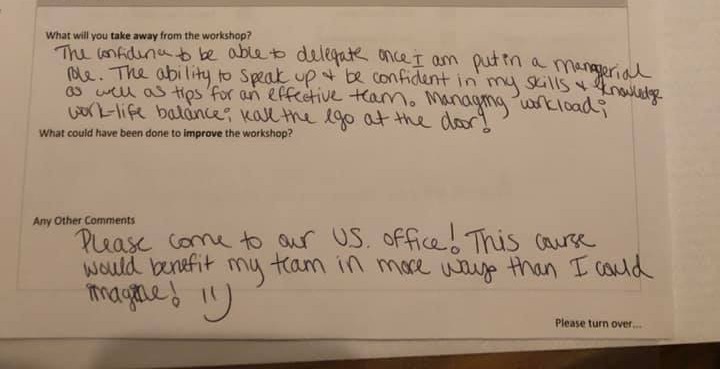 Manufacturing supervisor leading start-of-shift safety briefing with production team Manufacturing supervisor leading start-of-shift safety briefing with production team